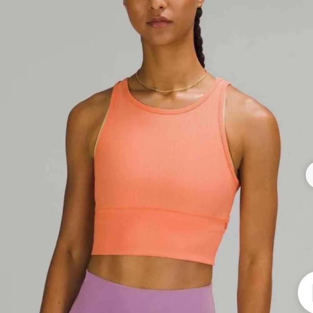 Lululemon orange ribbed crop top.